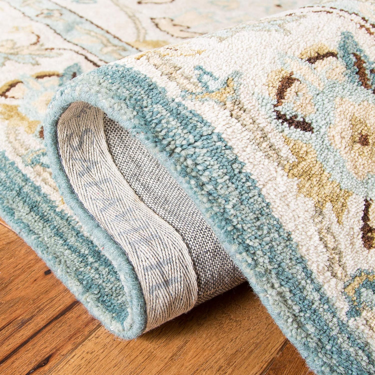 Handtufted Floral Oushak Style Wool Area Rug in Cream and Slate Blue