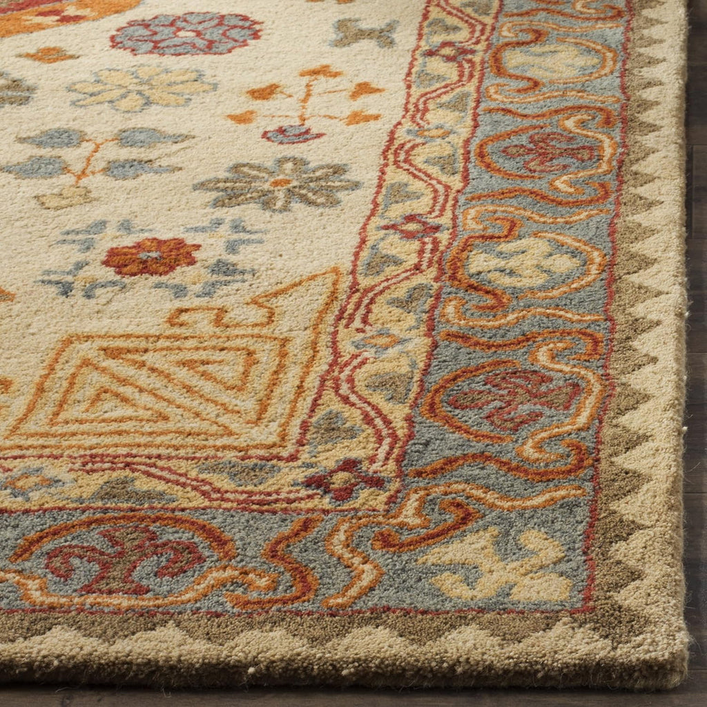 Antique-Inspired Geometric Floral Hand-Tufted Rug