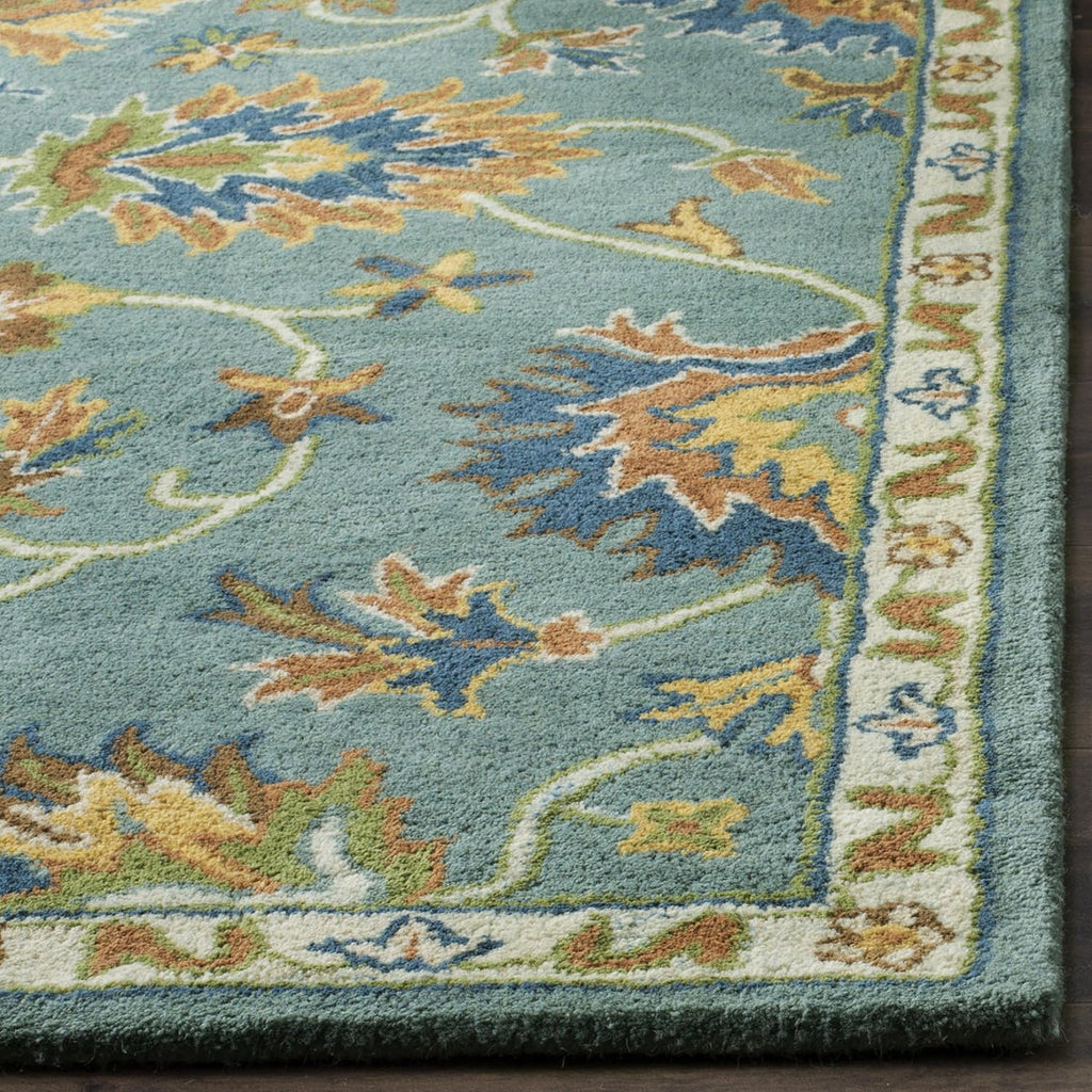 Vintage Elegance Hand-Tufted Floral Rug - Blue & Rust Accents