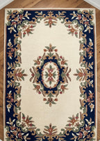 Premium Handtufted Botanical Border Rug with Navy Accent Medallion