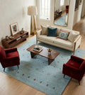 Artisanal Hand-Knotted Pale Azure Rug with Folk Symbols