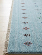 Artisanal Hand-Knotted Pale Azure Rug with Folk Symbols