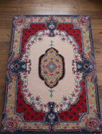 Hand-Tufted Floral Medallion Rug with Intricate Borders
