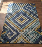 The Pixelated Petal Handtufted Rugs