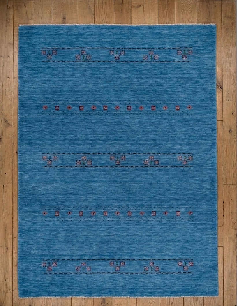 Hand-Knotted Sky Blue Gabbeh Rug with Tribal Floral Accents
