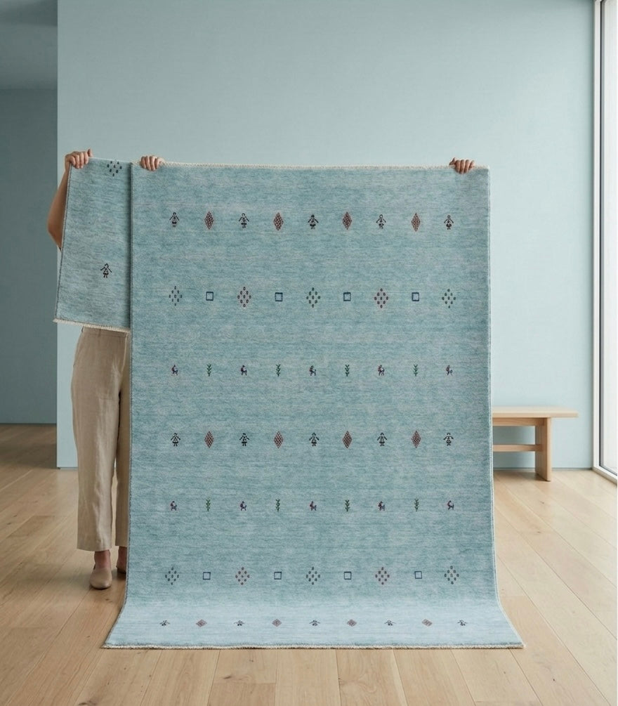 Artisanal Hand-Knotted Pale Azure Rug with Folk Symbols