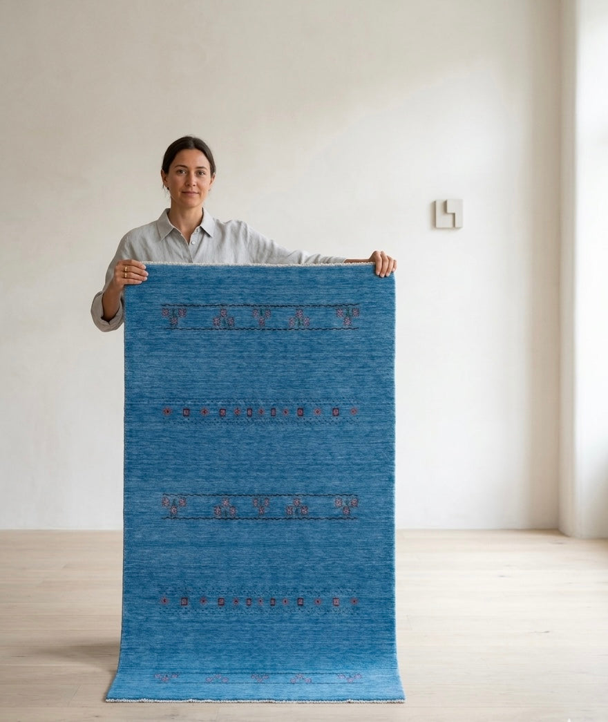 Hand-Knotted Sky Blue Gabbeh Rug with Tribal Floral Accents